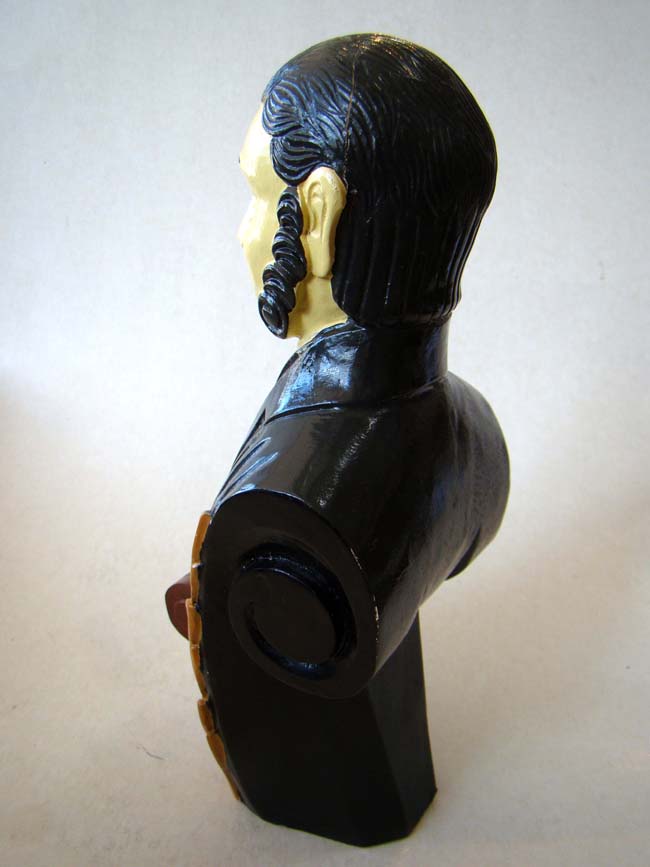 A miniature carved ship's figurehead — image 3